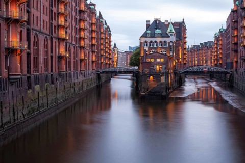 11.6.2018: Twilight view of the Wasserschloss (Water Castle) in the historic Speicherstadt district