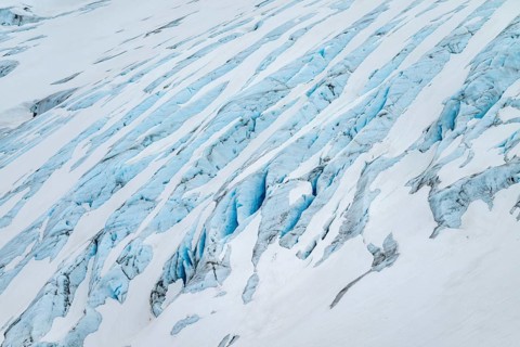 Blue rugged glacier ice with crevasses and snow, detail, Exit Glacier, Kenai Peninsula, Alaska, USA