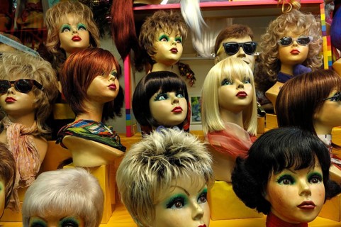Window mannequins of a wig studio in the main train station, Nuremberg, Middle Franconia, Bavaria,