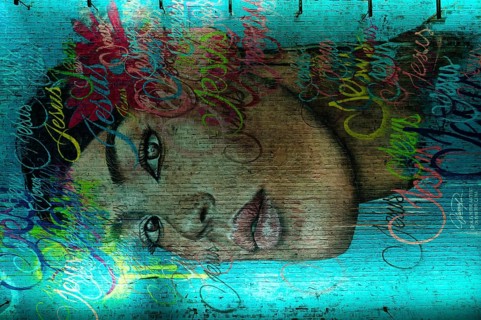 Portrait of a woman standing on the ceiling, legal, temporary graffiti in the graffiti tunnel,