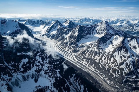 Snow and ice, epic mountains with glaciers, aerial view, Alaska Range, Denali National Park,