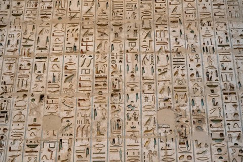 Close up details of the reliefs and hieroglyphs inside Medinat Habu, the ancient Egyptian Mortuary