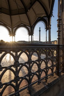 24.4.2026: The ornate cast iron music pavilion on Schlossplatz at sunrise. Sun star effect through