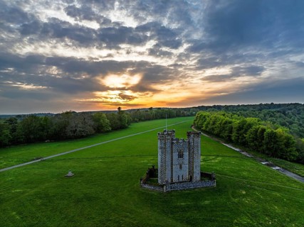 Sunset over Hiorne's Tower from a drone, Arundel, West Sussex, England, United Kingdom