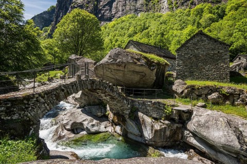 Traditional old stone houses and old stone arch bridge, Splueia Bella, near Foroglio, Val Calnègia,