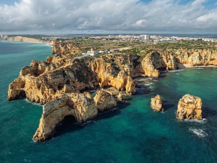 Aerial view of Ponte da Piedade in Lagos, Algarve, Portugal, with ocean channels, cliff faces and