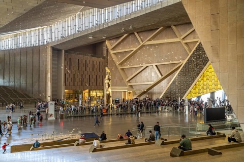 Colossal statue of Ramses II in the entrance hall of the Grand Egyptian Museum in Giza, Egypt