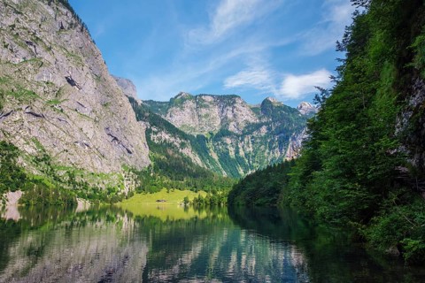 Obersee mountain lake Alps Bavaria Germany panorama showing calm reflective water, steep rocky