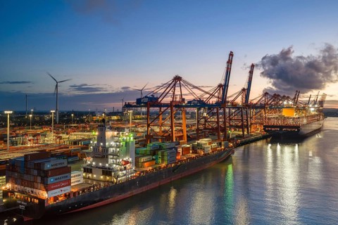 Aerial view at Waltershof harbour during the Blue Hour at the berths of Eurogate Container Terminal