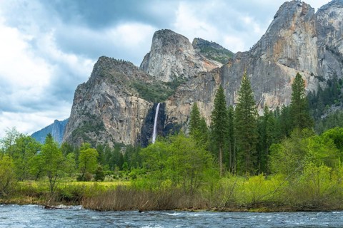 Yosemite national park showcasing bridalveil fall cascading down rugged granite cliffs, surrounded