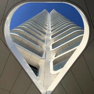 Heart-shaped view of the Grand Tower, first residential high-rise in Germany, Europaviertel,