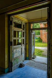 Dilapidated entrance to the former pulmonary sanatorium and lost place Heilstätte Grabowsee,