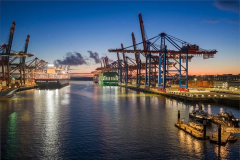 Panoramic aerial view at Waltershof harbour during the Blue Hour with Eurogate Container Terminal
