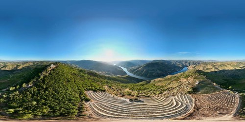 360 degree sunrise panorama of the Douro River winding through terraced vineyards and hills in