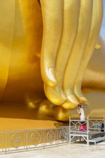 Thailand's largest Buddha statue (Luang Pho Yai), Thai woman, Wai gesture (traditional gesture of
