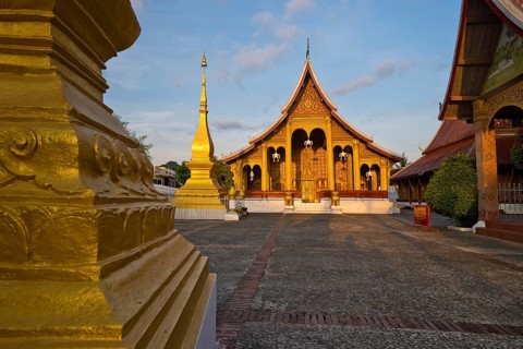Sunrise, morning atmosphere at Wat Sibounheuang Buddhist monastery, Luang Prabang, Laos, Southeast