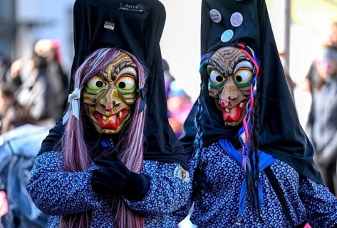 Members of a fools' guild in traditional Haes, fools' clothes, during the carnival procession in