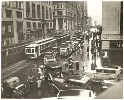 New York, 42nd Street, rain, traffic, streetcar, shops, department stores, Manhattan, USA, busy