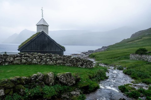 Funningur church in foggy weather, Faroe Islands