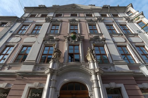Hartmann House, palais-like building around 1720, portal with two figures, the earthly and divine