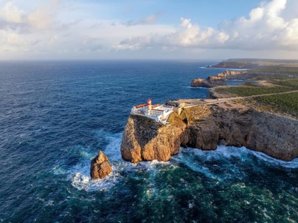 Drone view of the Lighthouse of Cabo de Sao Vicente in Sagres, Algarve, Portugal, at sunrise with