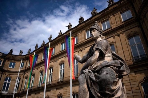 Statue, MINERVA, behind LGBTQ flags in rainbow colors, Stuttgart PRIDE, CSD, Christopher Street
