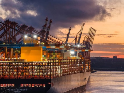 Aerial view at Waltershof harbour during the Blue Hour at the berths of Eurogate Container Terminal