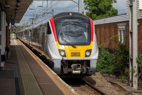 Greater Anglia Class 720 Aventra electric multiple unit locomotive train arriving at platform