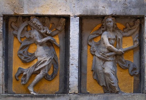 Stone relief over an entrance door, historic Böttcherstraße in the old town of the Hanseatic city