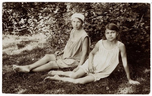 Bathing, swimwear, girls, leisure, fun, summer, Two girls in simple summer dresses sitting in the
