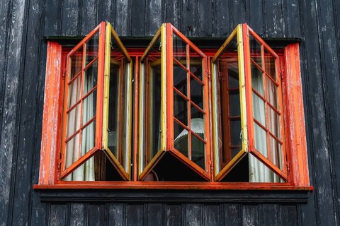 Red windows of a grass house, Streymoy, Faroe Islands