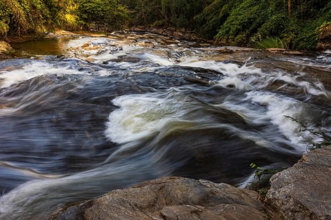 Flowing stream of the Mae Ya River, near Doi Inthanon National Park, Chiang Mai Province, Thailand
