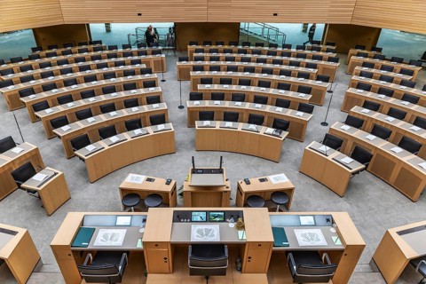 Empty meeting room in front of the start of the plenary session. Constituent session of the 18th