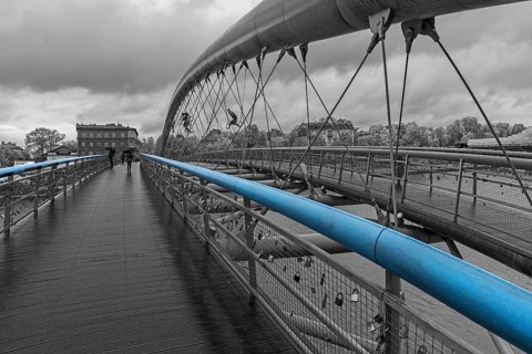 Father Bernatka wooden walkway, modern bridge over the Vistula, black and white, Krakow, Poland