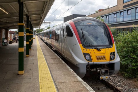 Greater Anglia Class 720 Aventra electric multiple unit locomotive train arriving at platform,