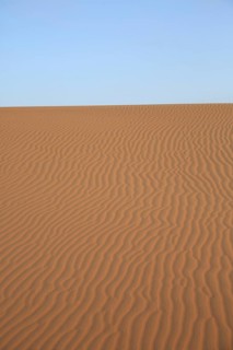View of vast sand dunes under clear blue sky, wallpaper, wave patterns in the sand, desert, Dubai,