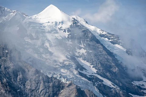 Glaciated summit of the Jungfrau, Bernese Alps, Bernese Oberland, Switzerland