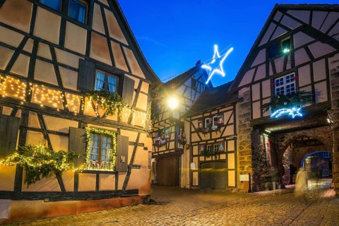 Colour-illuminated and Christmassy decorated half-timbered houses, blue hour, Christmas market,