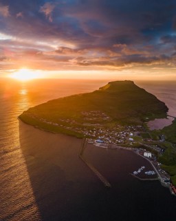 Sunset with aerial view of Eidi, Faroe Islands