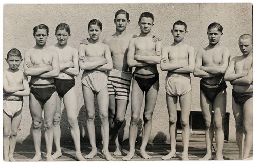 Bathing, swimwear, leisure, summer, boys and young people standing with folded arms in front of a