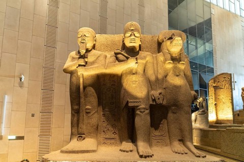 Group of statues with Pharaoh Ramesses II, creator god Ptah and the lion goddess Sekhmet in the