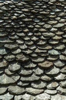 Traditional slate roof (lauze stone) in Aubrac, Aveyron department, Occitanie, France