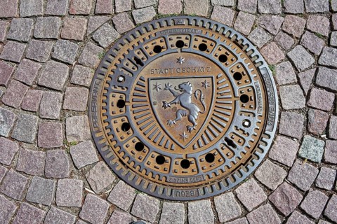Manhole cover of the city of Oschatz, manhole cover, Oschatz, Saxony, Germany