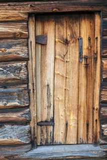 Door of a traditional wooden hut, Alvdal, Hedmark, Innlandet, Norway, June 2026