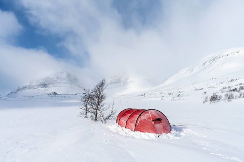Tent in snow, Kebnekaisefjäll, Norrbotten, Lapland, Sweden, March 2020