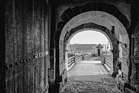 Old castle gate in black and white with a view of the countryside, The Wartburg near Eisenach in