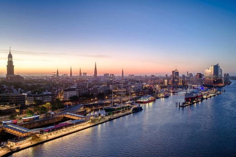 Aerial view of Landungsbrücken (Jan Fedder Promenade) at sunrise on the Elbe with Elbe Philharmonic