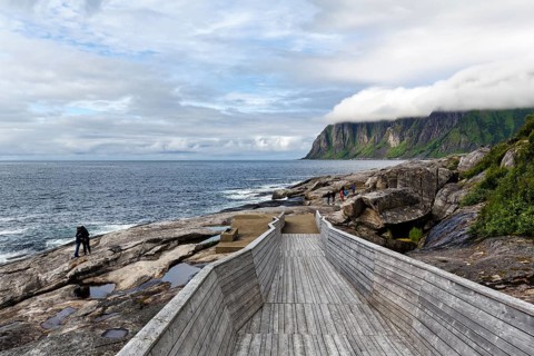 Tungeneset viewpoint, rest area, wooden walkway to the sea, hiker, rocky coast, Okshornan mountain
