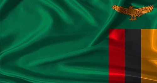 National flag of Zambia with cloth texture. Zambia flag with realistic texture background