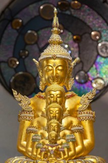 The Buddhas nestled within one another symbolise the inner journey, the continuity of the teachings